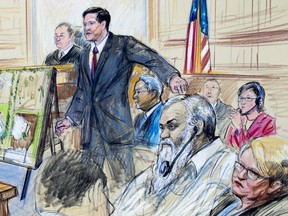 This courtroom sketch depicts Ahmed Abu Khattala listening to a interpreter through earphones during the opening statement by assistant U.S. attorney John Crabb, second from left, at federal court in Washington in the trial presided by U.S. District Judge Christopher Cooper, Monday, Oct. 2, 2017. Khattala, the suspected mastermind of the 2012 attacks on a diplomatic compound in Benghazi, Libya, that killed four Americans, is on trial. Defense attorney Jeffery Robinson, sits behind Crabb in a light blue suit and Michelle Peterson, also a member of the defense team, is at far right. (Dana Verkouteren via AP)