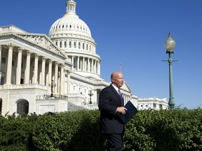 FILE - In this Sept. 28, 2017, file photo House Ways and Means Chairman Rep. Kevin Brady, R-Texas, arrives for a news conference on Capitol Hill in Washington. Brady, one of the chief architects of the sweeping tax revamp proposed by President Donald Trump and congressional Republicans isn't yet saying whether promised cuts under the plan would be retroactive to the start of the year. "To be determined" was the response Oct. 2 from Brady. ( AP Photo/Jose Luis Magana)