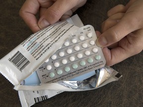 FILE - In this Aug. 26, 2016, file photo, a one-month dosage of hormonal birth control pills is displayed in Sacramento, Calif.  The Trump administration's new birth control rule is raising questions among some doctors and researchers. They say it overlooks known benefits of contraception while selectively citing data that raise doubts about effectiveness and safety. Recently issued rules allow more employers to opt out of covering birth control as a preventive benefit for women under former President Barack Obama's health care law.(AP Photo/Rich Pedroncelli, File)