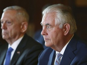 FILE - In this June 5, 2017, file photo, U.S. Secretary of State Rex Tillerson, right, and U.S. Secretary of Defense Jim Mattis participate in talks at Government House in Sydney. President Donald Trump's national security brain trust faces Congress on the need for a new war authorization as the deadly ambush in Niger is fueling a push among many lawmakers to update the legal parameters for combat operations overseas. (Mark Metcalfe/Pool Photo via AP, File)