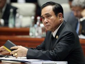 FILE - In this Sept. 5, 2017, file photo, Thailand's Prime Minister Prayuth Chan-ocha attends the Dialogue of Emerging Market and Developing Countries on the sidelines of the BRICS Summit in Xiamen, China. President Donald Trump hosts the Thailand's junta leader at the White House on Oct. 2, a rare instance of a military ruler being feted in Washington before even a nominal return to civilian rule.  (Wu Hong/Pool Photo via AP)