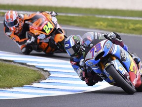 Spain's Moto2 rider Alex Marquez steers his Kalex during the third practice session for the Australian Motorcycle Grand Prix at Phillip Island near Melbourne, Australia, Saturday, Oct. 21, 2017. (AP Photo/Andy Brownbill)