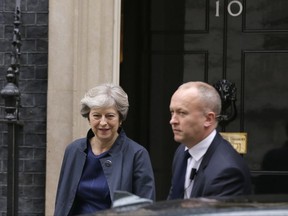 Britain's Prime Minister Theresa May leaves 10 Downing Street in London, for meetings in Brussels, Thursday, Oct. 19, 2017. (AP Photo/Alastair Grant)