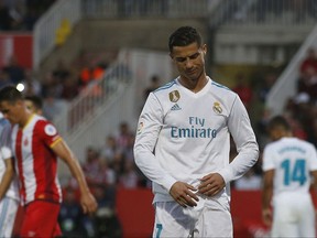Real Madrid's Cristiano Ronaldo looks down after another attempt on goal during the La Liga soccer match between Girona and Real Madrid at the Montilivi stadium in Girona, Spain, Sunday, Oct. 29, 2017. (AP Photo/Manu Fernandez)