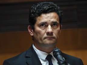 Sergio Moro, the Brazilian federal judge responsible for the "Operation Car Wash" corruption investigation, speaks after awarded the Notre Dame Award, in Sao Paulo, Brazil, Monday, Oct. 2, 2017. Moro isn't setting a timeline for when the "Car Wash" probe will wrap up, but he says he is personally "a bit tired" of the work and believes it is in its final phases. (AP Photo/Andre Penner)