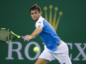 Ryan Harrison of the United States prepares to return a shot against Grigor Dimitrov of Bulgaria during their men's singles match of the Shanghai Masters tennis tournament at Qizhong Forest Sports City Tennis Center in Shanghai, China, Wednesday, Oct. 11, 2017. (AP Photo/Andy Wong)