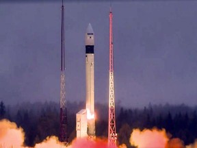 In this frame grab taken from the video distributed by Roscosmos Space Agency Press Service, The European Space Agency's Sentinel-5P satellite launches by a Rokot missile from the Plesetsk launch pad in northwestern Russia, Friday, Oct. 13, 2017. A Russian booster rocket has carried a European environmental satellite into orbit. (Roscosmos Space Agency Press Service photo via AP)
