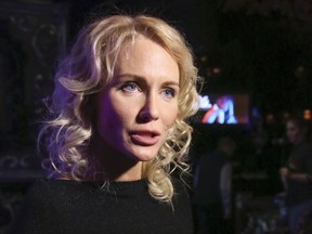 In this photo taken on Wednesday, Oct. 19, 2016, Russian journalist Yekaterina Gordon speaks to the media in Moscow, Russia.The 37-year old Gordon has joined the ranks of those wanting to run in March's presidential election. (Boris Kudryavov/Komsomolskaya Pravda via AP)