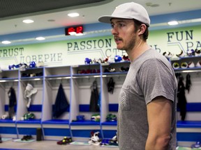 In this handout photo released by Salavat Yulaev Hockey Club on Oct. 3, Canadian goaltender Ben Scrivens tours the Salavat Yulaev locker room in Ufa, Russia.