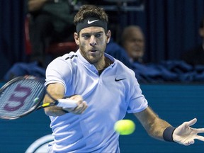 Argentina's Juan Martin Del Potro returns a shot to Croatia's Marin Cilic during their semifinal match at the Swiss Indoors tennis tournament at the St. Jakobshalle in Basel, Switzerland, on Saturday, Oct. 28, 2017. (Alexandra Wey/Keystone via AP)