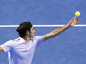 Switzerland's Roger Federer serves a ball to Argentina's Juan Martin del Potro during the final at the Swiss Indoors tennis tournament  in Basel, Switzerland, on Sunday, Oct. 29, 2017. (Georgios Kefalas/Keystone via AP)