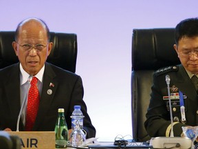 Philippines Defense Secretary Delfin Lorenzana, left, with Armed Forces Chief Gen. Eduardo Ano, presides the 11th ASEAN Defense Ministers Meeting Monday, Oct. 23, 2017 in Clark, Pampanga province north of Manila, Philippines. The annual meeting, which the Philippines is hosting this year, also includes its dialogue partners such as United States, Australia, Japan, South Korea, New Zealand and India. (AP Photo/Bullit Marquez)