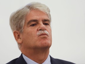 Spain's Foreign Minister Alfonso Dastis attends a news conference in Kiev, Ukraine, Monday, Oct. 30, 2017. On Sunday Spain's Foreign Minister Alfonso Dastisr said that Catalonia's deposed leader is now out of a job "no matter what he says" but could run in December's early regional election if he hasn't been imprisoned by then. (AP Photo/Efrem Lukatsky)