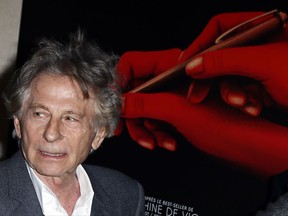 Director Roman Polanski poses during a photo call prior to the screening of "Based on a true story" in Paris, France, Monday Oct. 30, 2017. France's famed film institute La Cinematheque Francaise says it will go ahead with a retrospective of works by director Roman Polanski despite opposition by feminist groups, in regard to the Polish-born director who in the 1970s pleaded guilty to having sex in the U.S. with a 13-year-old girl whom he plied with champagne and Quaaludes. (AP Photo/Francois Mori)