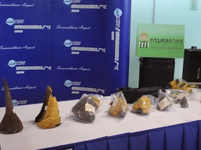 In this photo released by Royal Thai Customs, a collection of seized Rhino horns are on display in Bangkok, Thailand, Wednesday, Oct. 11, 2017. Thai authorities have arrested two Chinese nationals after seizing eight rhino horns from their luggage at Bangkok airport on Tuesday, Oct. 10, 2017. (Royal Thai Customs via AP)