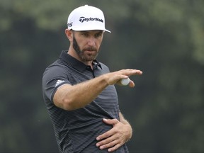 Dustin Johnson of United States gestures in the final round of the 2017 WGC-HSBC Champions golf tournament held at the Sheshan International Golf Club in Shanghai, China, Sunday, Oct. 29, 2017. Johnson, the world's No. 1 player going for his third World Golf Championships title of the year, lost a six-shot lead Sunday. That matches the largest blown lead in the final round on the PGA Tour, most recently by Sergio Garcia at Quail Hollow in 2005 and Greg Norman in the 1996 Masters. (AP Photo/Ng Han Guan)