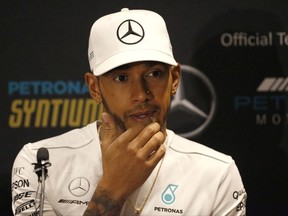 Mercedes driver Lewis Hamilton, of Britain, gives a press conference in Mexico City, Wednesday, Oct. 25, 2017. If Hamilton finishes fifth or higher in the Mexico City Grand Prix next weekend, he will claim his third season championship in four years and his fourth overall. (AP Photo/Marco Ugarte)