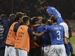 Italian players celebrate the goal of their team during the World Cup Group G qualifying soccer match between Albania and Italy at Loro Borici stadium, in Shkoder, northern Albania, Monday, Oct. 9, 2017. Italy won 1-0.(AP Photo/Hektor Pustina)