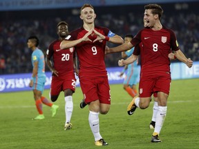 U.S. soccer player Josh Sargent celebrates a goal against India during their FIFA U-17 World Cup match in New Delhi, India, Friday, Oct. 6, 2017. (AP Photo/Tsering Topgyal)