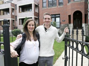 Emily and Brian Townsend outside their home in Chicago.