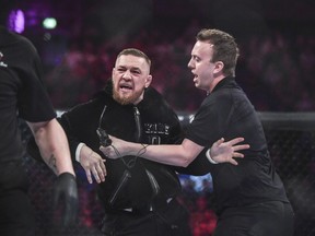 Conor McGregor invades the ring at Bellator 187 in Dublin on Nov. 10.