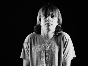 Rhythm guitarist Malcolm Young from Australian rock band AC/DC posed in a studio in London in August 1979.