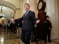 Sen. Rand Paul (R-KY) gestures toward reporters following the weekly Republican policy luncheon at the U.S. Capitol October 24, 2017 in Washington, DC.