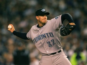 Roy Halladay pitches for the Toronto Blue Jays at Yankee Stadium on April 1, 2008.