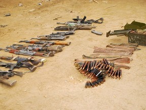 This handout picture released by the Nigerian army on April 30, 2015 purportedly shows weapons and ammunitions seized in an operation against the Islamist group Boko Haram.