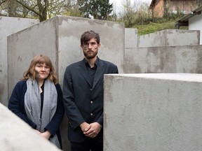 Morius Enden and Jenni Moli of the the art collective "Centre for Political Beauty," inside the replica of Berlin's Holocaust Memorial that was secretly erected overnight near the home of far-right AfD politician Bjoern Hoecke on November 22, 2017.