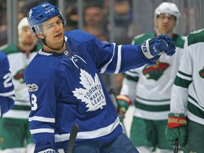 Connor Carrick of the Maple Leafs celebrates a goal against the Minnesota Wild during their game at the Air Canada Centre in Toronto on Wednesday night. The Leafs won 4-2.