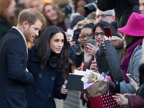 Prince Harry and fiancee Meghan Markle arrive at the Terrance Higgins Trust World AIDS Day charity fair at Nottingham Contemporary on December 1, 2017 in Nottingham, England.