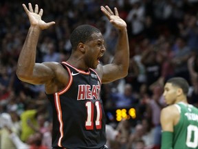 Miami Heat's Dion Waiters (11) reacts after scoring during the second half of an NBA basketball game against the Boston Celtics, Wednesday, Nov. 22, 2017, in Miami. The Heat won 104-98. (AP Photo/Lynne Sladky)