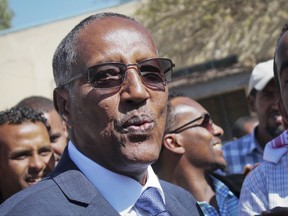 FILE - In this Monday Nov. 13, 2017 file photo, ruling party candidate Muse Bihi Abdi speaks to the media after casting his vote in the presidential election in Hargeisa, in the semi-autonomous region of Somaliland, in Somalia. The ruling party candidate in Somalia's semi-autonomous region of Somaliland has been declared the winner of the presidential election but the opposition claims irregularities in the vote. (AP Photo/Barkhad Kaariye, File)