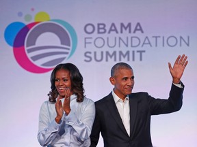 Former U.S. President Barack Obama and his wife Michelle arrive at the Obama Foundation Summit in Chicago, Illinois, October 31, 2017.
