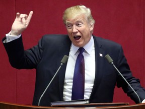 Donald Trump addresses the National Assembly in Seoul on November 8, 2017.
