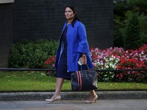 This file photo taken on September 12, 2017 shows Britain's International Development Secretary Priti Patel arriving to attend the weekly meeting of the cabinet at Downing Street in central London.