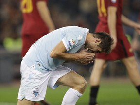 Lazio's Senad Lulic reacts after missing a scoring chance during an Italian Serie A soccer match between AS Roma and Lazio, at the Olympic stadium in Rome, Saturday, Nov. 18, 2017. (AP Photo/Andrew Medichini)