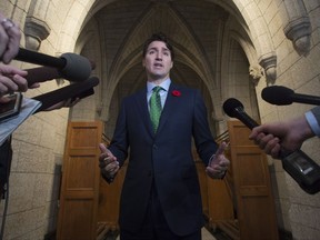 Canadian Prime Minister Justin Trudeau speaks with the media as he makes his way to caucus on Parliament Hill in Ottawa on November 1, 2017. Prime Minister Justin Trudeau says an "awakening" is sweeping society about the issue of workplace harassment and violence as the dominoes continue to fall from the Harvey Weinstein scandal. Trudeau suggested that awareness being raised around the issue could reverse trends that show incidents are not only under-reported, but are often not dealt with properly when they are brought forward. THE CANADIAN PRESS/Adrian Wyld