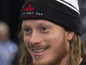 Toronto Argonauts linebacker Bear Woods smiles as he speaks with reporters during the CFL Grey Cup Media Day Thursday November 23, 2017 in Ottawa. The Toronto Argonauts will play the Calgary Stampeders in the 105th Grey Cup. THE CANADIAN PRESS/Adrian Wyld