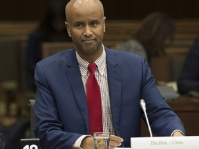 Minister of Immigration, Refugees and Citizenship Ahmed Hussen waits to appear before the Commons Citizenship and Immigration committee in Ottawa, Thursday November 23, 2017. THE CANADIAN PRESS/Adrian Wyld
