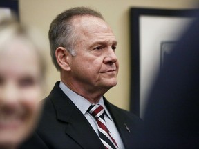 Former Alabama Chief Justice and U.S. Senate candidate Roy Moore waits to speak the Vestavia Hills Public library, Saturday, Nov. 11, 2017, in Birmingham, Ala. According to a Thursday, Nov. 9 Washington Post story an Alabama woman said Moore made inappropriate advances and had sexual contact with her when she was 14. Moore is denying the allegations. (AP Photo/Brynn Anderson)