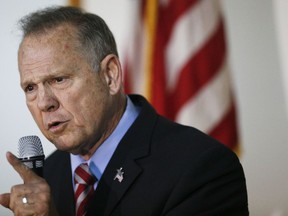 Former Alabama Chief Justice and U.S. Senate candidate Roy Moore speaks at a campaign rally, Monday, Nov. 27, 2017, in Henagar, Ala. (AP Photo/Brynn Anderson)