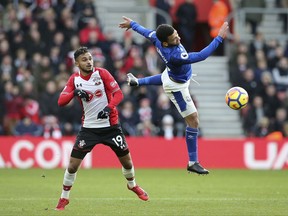Southampton's Sofiane Boufal, left vies for the ball with Everton's Aaron Lennon during the English Premier League soccer match at St Mary's in Southampton, England, Sunday Nov. 26, 2017. (Mark Kerton/PA via AP)