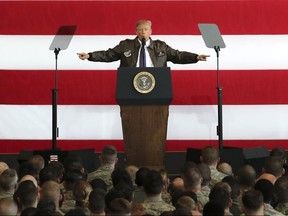 U.S. President Donald Trump delivers a speech to American troops at the Yokota Air Base near Tokyo on Nov. 5.