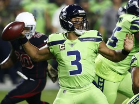 Seattle Seahawks quarterback Russell Wilson (3) throws against the Arizona Cardinals during the first half of an NFL football game, Thursday, Nov. 9, 2017, in Glendale, Ariz. (AP Photo/Ross D. Franklin)