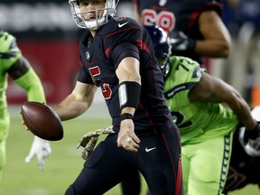 Arizona Cardinals quarterback Drew Stanton (5) scrambles against the Seattle Seahawks during the first half of an NFL football game, Thursday, Nov. 9, 2017, in Glendale, Ariz. (AP Photo/Ross D. Franklin)