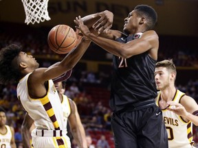Arizona State guard Remy Martin steals the ball away from San Diego State forward Malik Pope during the first half of an NCAA college basketball game Tuesday, Nov. 14, 2017, in Tempe, Ariz. (Rob Schumacher/The Arizona Republic via AP)