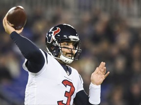 Houston Texans quarterback Tom Savage (3) passes the ball during the first half of an NFL football game against the Baltimore Ravens in Baltimore, Monday, Nov. 27, 2017. (AP Photo/Gail Burton)