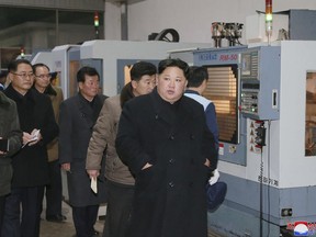 In this undated photo provided on Tuesday, Nov. 21, 2017, by the North Korean government, North Korean leader Kim Jong Un visits the the Sungri Motor Complex in Pyeongannam-do, North Korea. The Trump administration is due to announce new sanctions on North Korea on Tuesday, Nov. 21, 2017, after declaring it a state sponsor of terrorism in the latest push to isolate the pariah nation. Independent journalists were not given access to cover the event depicted in this image distributed by the North Korean government. The content of this image is as provided and cannot be independently verified. Korean language watermark on image as provided by source reads: "KCNA" which is the abbreviation for Korean Central News Agency. (Korean Central News Agency/Korea News Service via AP)